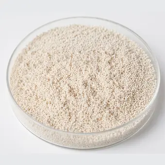 Acrylic Weak Acid Cation (WAC) resin beads in a laboratory petri dish